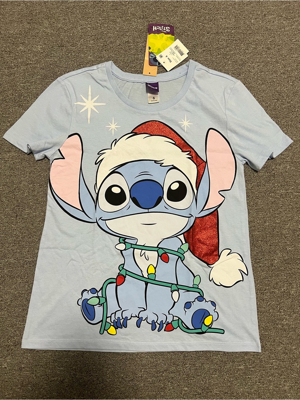 Disney Light Blue Stitch Holiday Tee with Santa Hat Graphic Women’s Size 6